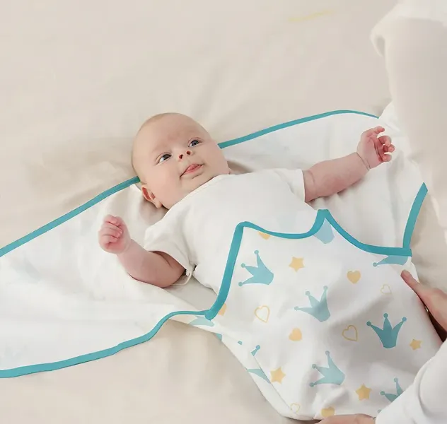 baby in open swaddle